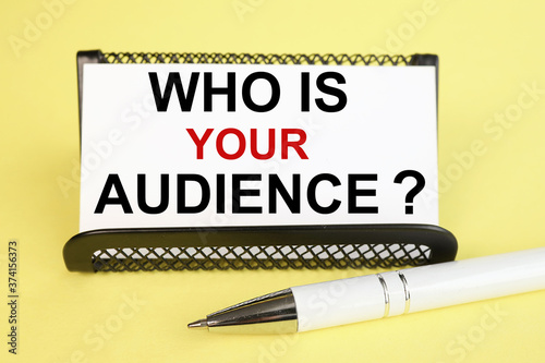 who is your audience. text on white paper on yellow background