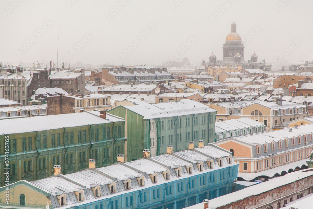 Rooftop cityscape of Saint Petersburg in winter time wit view on Saint Isaac's cathedral