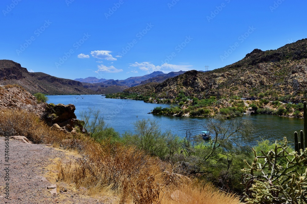 A cool refreshing  lake hidden in the desert hills of Arizona.