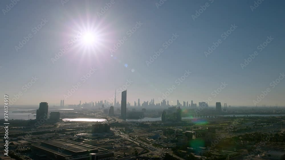 An aerial shot showing the development of Dubai Festival City area panning left then right pass Business Bay Crossover Bridge & the Dubai Skyline, Pan Right, 6-axis stabilized gimbal, Shotover F1, 8K. An aerial shot showing the development of Dubai Festival City area panning left then right pass Business Bay Crossover Bridge & the Dubai Skyline, Pan Right, 6-axis stabilized gimbal, Shotover F1, 8K.