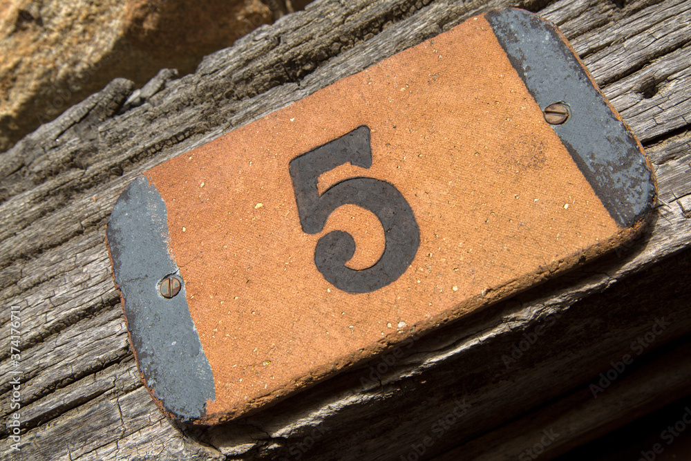 Number Five on Wood with Diagonal