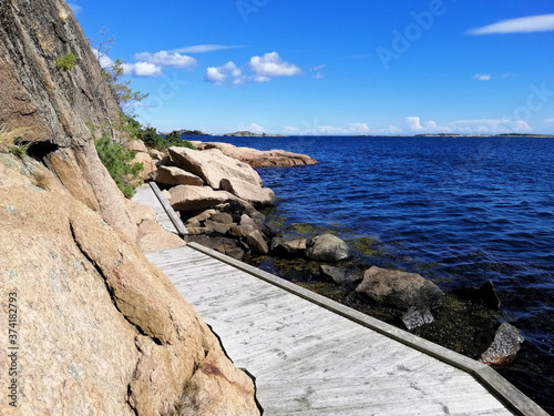 Beautiful shot of the sea taken from the beach of Gjeving, Norway photo