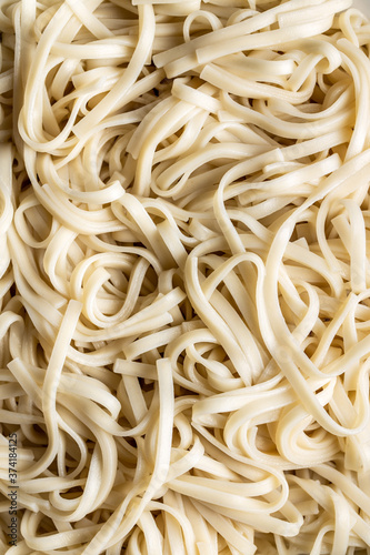 Fényképezés Cooked udon noodles. Traditional Japanese noodles.