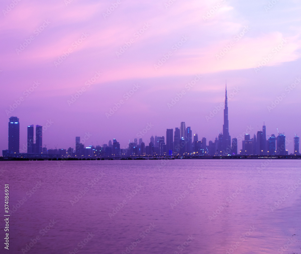 Sunset over a skyline of a beautiful city of Dubai. UAE.