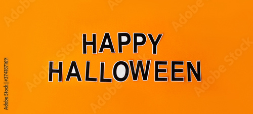 Happy Halloween letters isolated on orange background