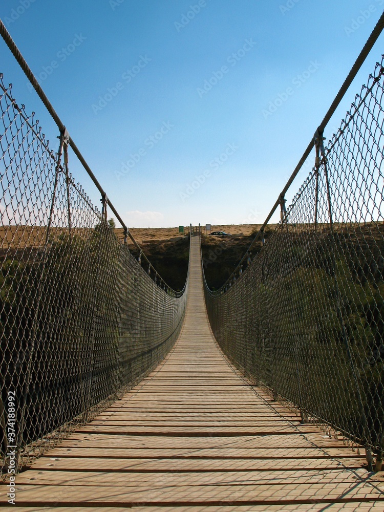 Fototapeta premium narrow bridge in the morning