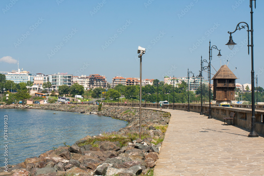 BULGARIA windmill and road to old historical centre of the town Nesebar, UNESCO World heritage site,
