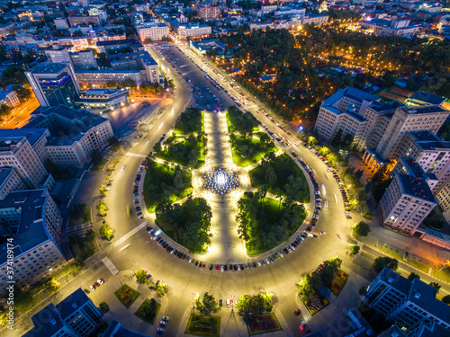 Aerial evening view to Svobody square and Derzhprom in Kharkiv, Ukraine photo