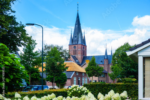 Village scene with church in Bergharen  Netherlands 