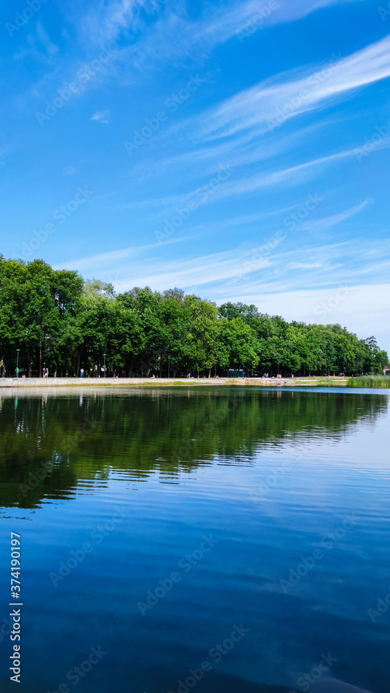 Fototapeta premium Amazing landscape background with lake and sky in the summer season