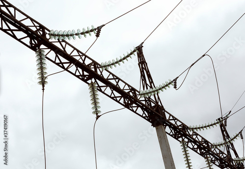 Electric pole, power lines and blue sky