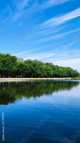 Amazing landscape background with lake and sky in the summer season