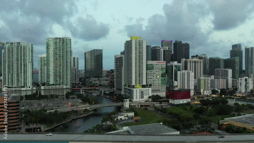 Lateral clip Downtown Miami Brickell and river with dramatic sky clouds Lateral clip Downtown Miami Brickell and river with dramatic sky clouds