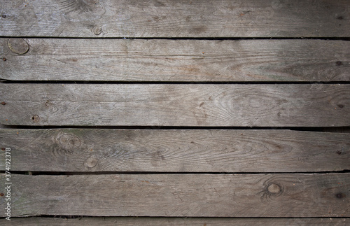 Light grey vintage weathered wooden texture or background.. The texture of the tree. Old staphets.