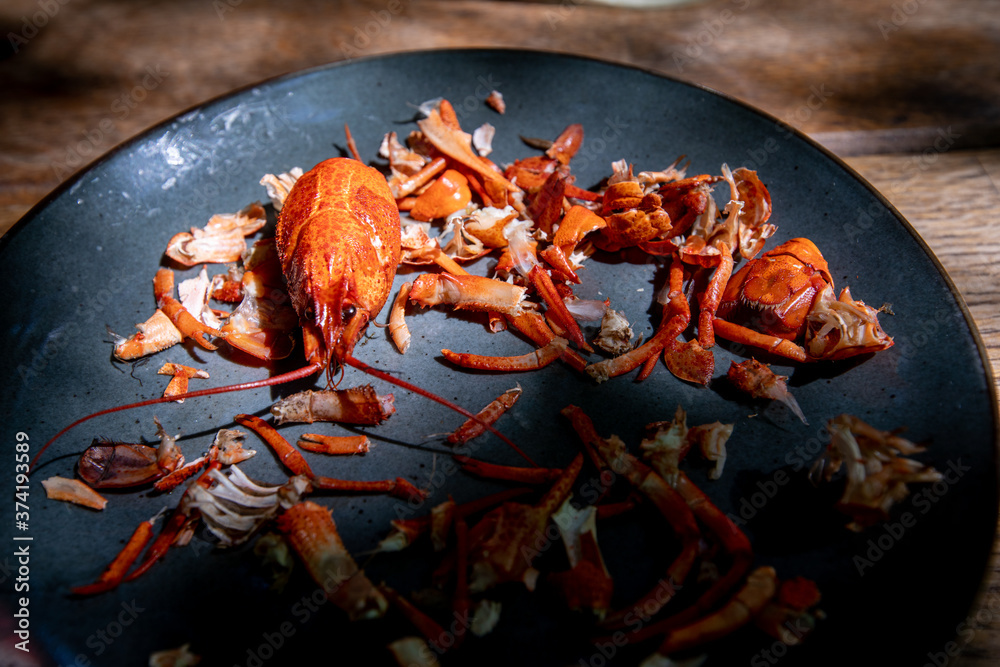 Pieces of crayfish that someone has already eaten Pieces of crayfish that someone has already eaten