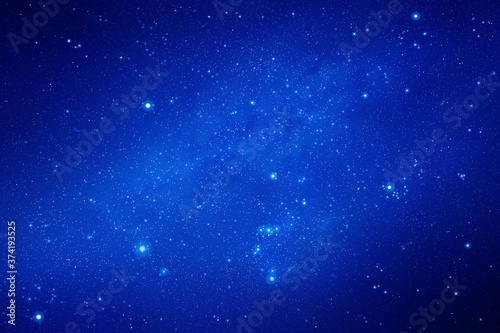 Space background with night starry sky and Milky Way. Vector illustration with our galaxy in cosmos. Dark blue backdrop with fragment of universe