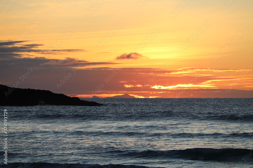 Fototapeta premium sunset over the sea, hosta beach, north uist, hebrides, scotland