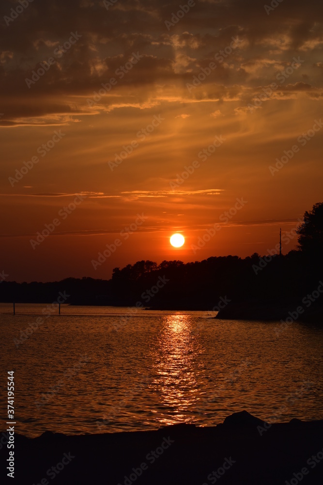 orange sunset over lake