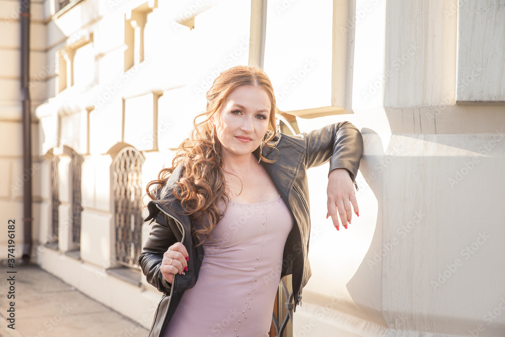Travel through the cities of Europe. Attractive girl, woman at the Travel through the cities of Europe. Attractive girl, woman at the