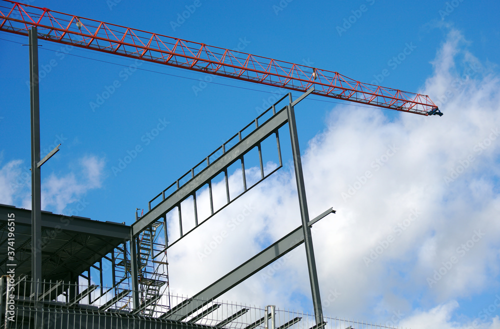 construction crane lifting metal beams structure tower construction crane lifting metal beams structure tower