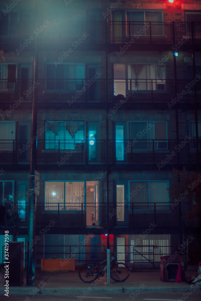 Facade of apartment building at night