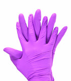 Hands of a medic wearing a violet latex gloves, white background.