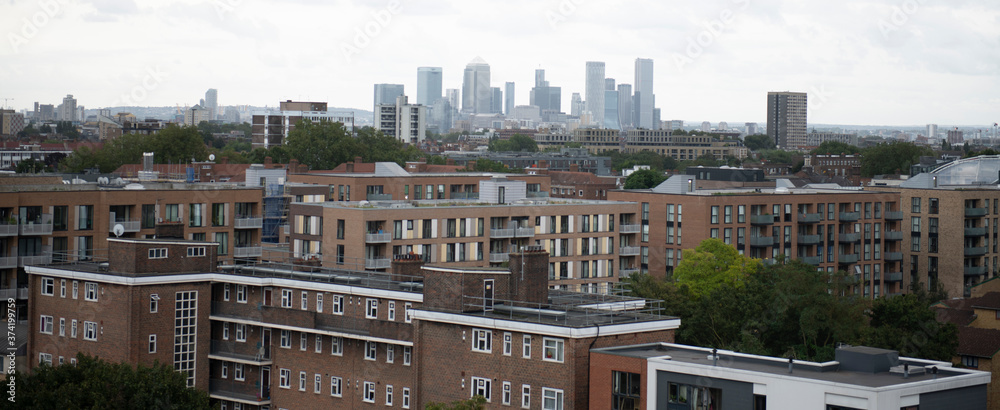 panoramic view of London with Canary Wharf in background photographed from dalston