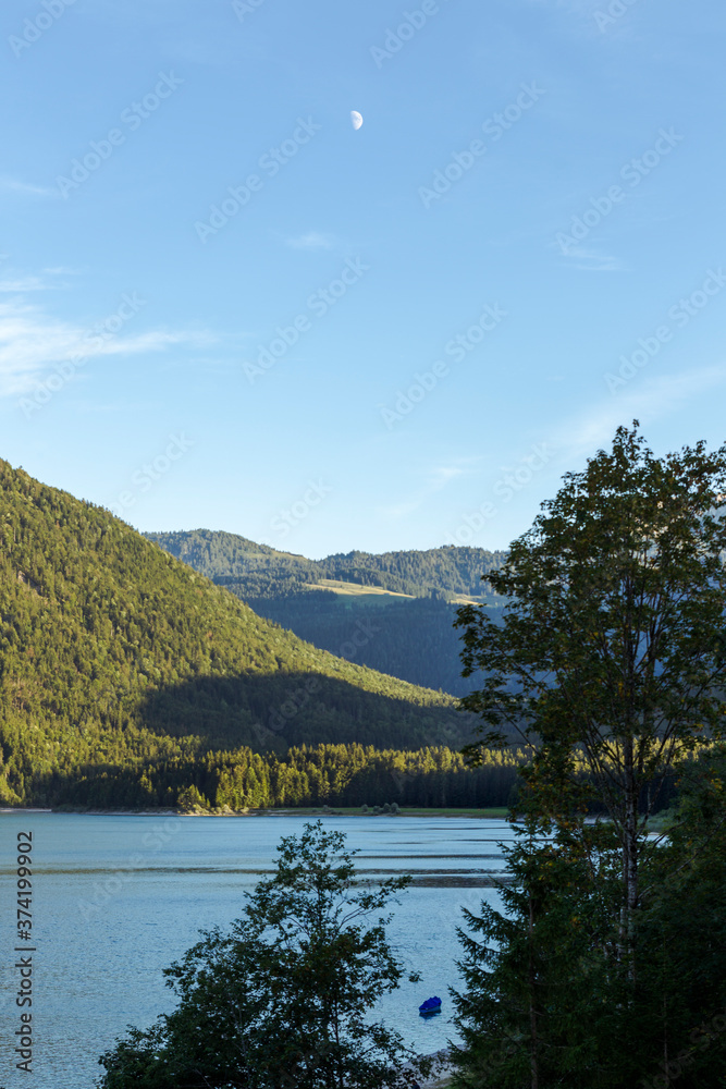 View over the Alps and the Sylvenstein Reservoir on a sunny summer evening