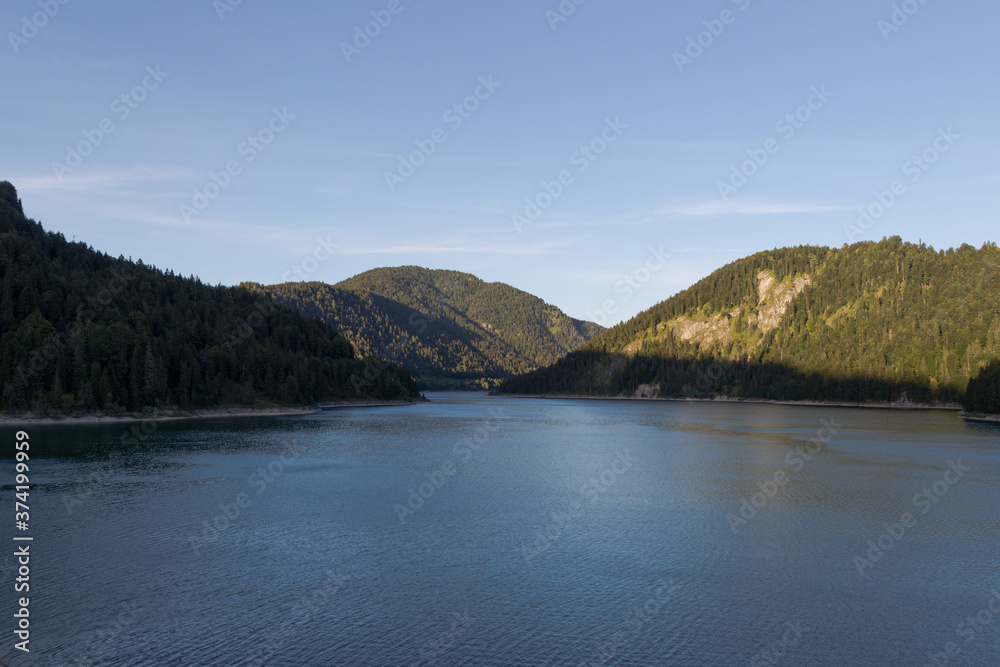 View over the Alps and the Sylvenstein Reservoir on a sunny summer evening