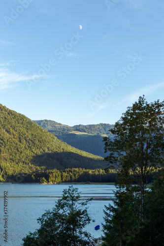 View over the Alps and the Sylvenstein Reservoir on a sunny summer evening