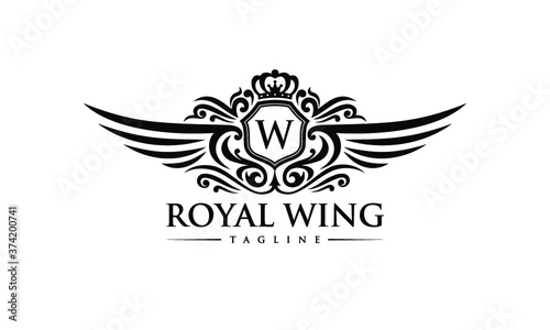 Classy Black Royal Wing Logo on White Background - Fancy Letter Crest Design - Elegant Vintage Initial Brand Icon - Luxury Wing and Crown Monogram - Heraldic King Vector Illustration
