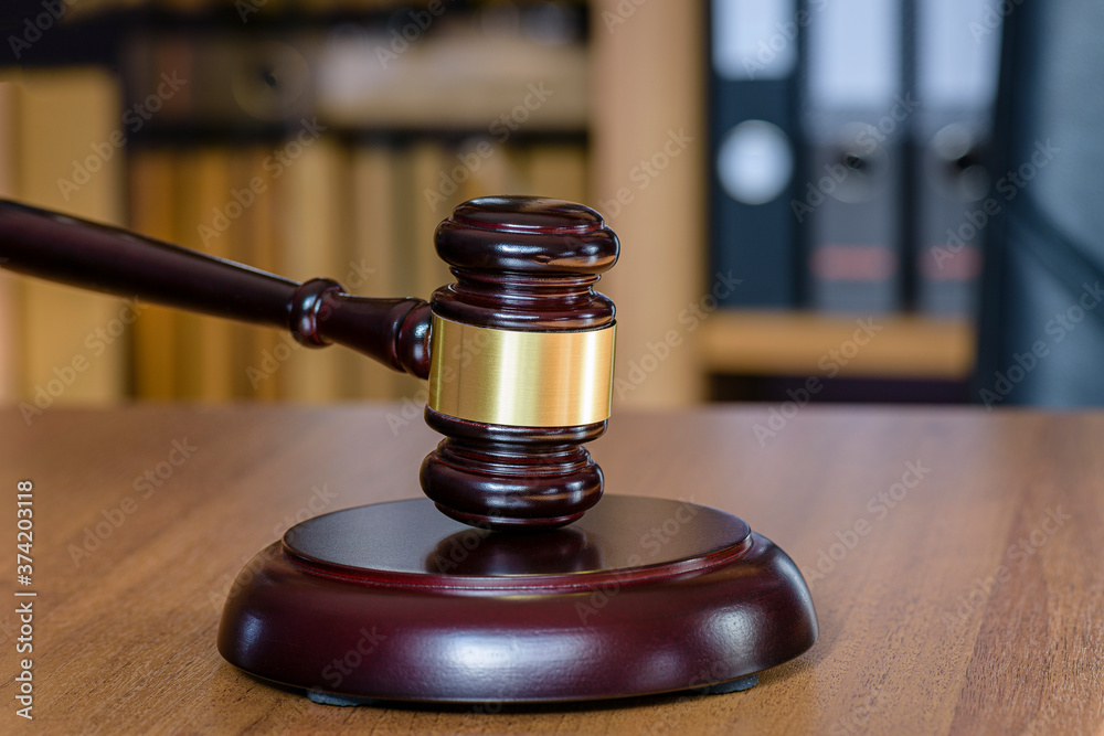 Judicial gavel on the judge's table. Concept legal zone in the punishment system. Judgment of judgment concept of punishment and pardon. Symbol of law is the hammer of judge. Judicial gavel on the judge's table. Concept legal zone in the punishment system. Judgment of judgment concept of punishment and pardon. Symbol of law is the hammer of judge.