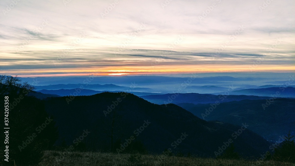 sunset over the mountains sunset over the mountains