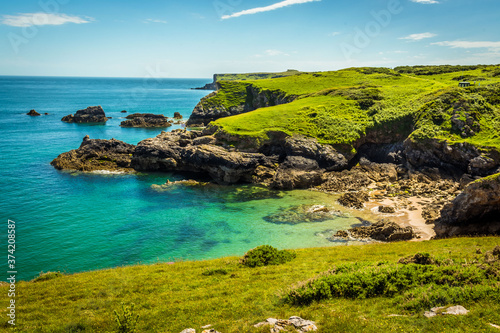 Stampa su tela Turquoise sea at a secluded cove near Broad Haven on the Pembrokeshire coast in