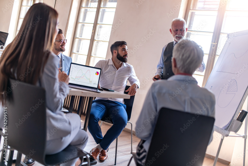 Business people work together in office. Business people work together in office.