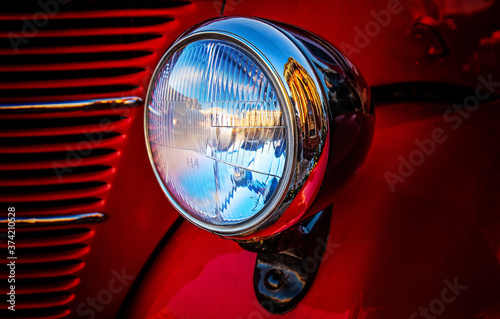 Detailes of a retro red car in Bucharest displayed in the Christmas Market.