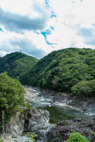 Summer hiking on a discontinued train-line between Takedao and Namaze in Hyogo prefecture in Japan © Kazu