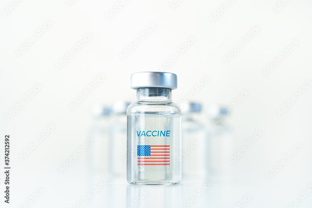 Transparent vials with USA flag. Vaccine for covid-19 coronavirus, flu, infectious diseases. Injection after clinical trials for vaccination of human, child, adult, senior. Medicine, drug concept Transparent vials with USA flag. Vaccine for covid-19 coronavirus, flu, infectious diseases. Injection after clinical trials for vaccination of human, child, adult, senior. Medicine, drug concept