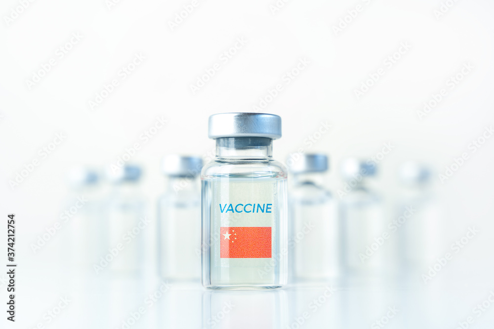 Transparent vials with China flag. Vaccine for covid-19 coronavirus, flu, infectious diseases. Injection after clinical trials for vaccination of human, child, adult, senior. Medicine, drug concept Transparent vials with China flag. Vaccine for covid-19 coronavirus, flu, infectious diseases. Injection after clinical trials for vaccination of human, child, adult, senior. Medicine, drug concept