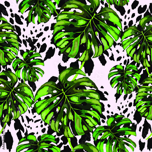 Tropical seamless pattern on animalistic texture. Jungle exotic summer print. Summer tropical leaf. Tropical flower fashion pattern. Floral tropic illustration. Vector seamless pattern.