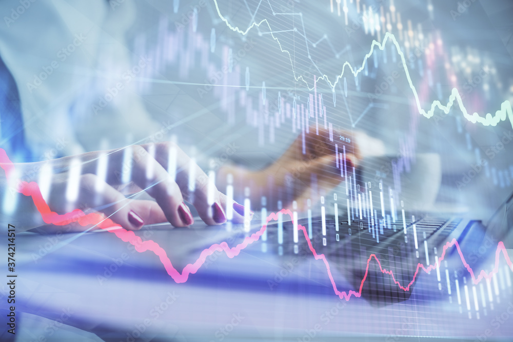 Multi exposure of woman hands typing on computer and financial graph hologram drawing. Stock market analysis concept. Multi exposure of woman hands typing on computer and financial graph hologram drawing. Stock market analysis concept.