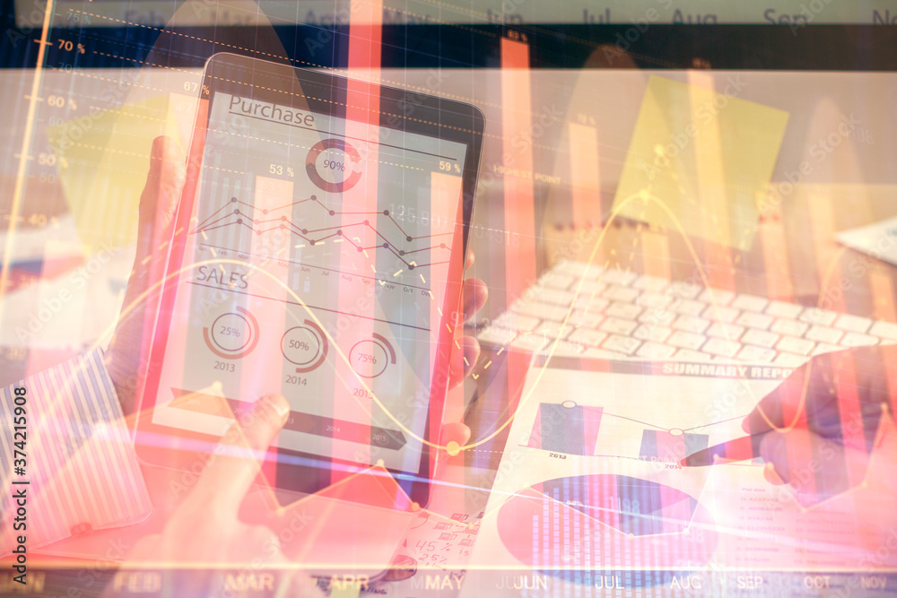 Multi exposure of man's hands holding and using a phone and financial chart drawing. Market analysis concept. Multi exposure of man's hands holding and using a phone and financial chart drawing. Market analysis concept.