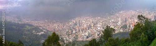 Vista panorámica de la ciudad de Bogotá desde el cerro de Monserrate, ciudad bajo las nubes vista aerea © Alfonso