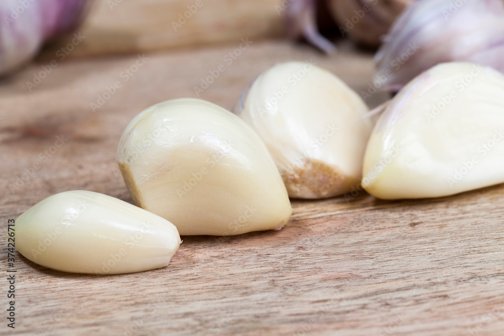 cloves and heads of ripe garlic cloves and heads of ripe garlic