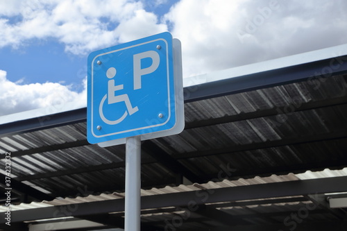 Signs for parking spaces for people with disabilities in petrol stations