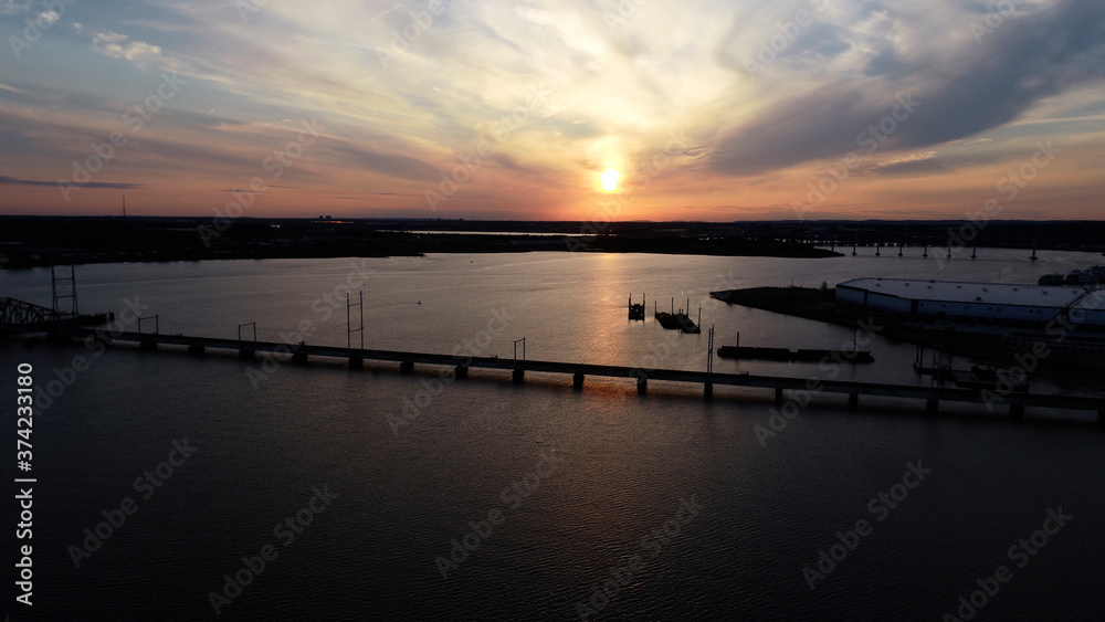 Aerial view of sun setting on Raritan Bay in Perth Amboy, NJ