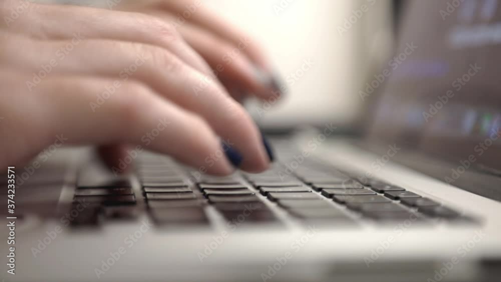 Hands Typing On A Laptop Keyboard. - Close Up Shot Hands Typing On A Laptop Keyboard. - Close Up Shot