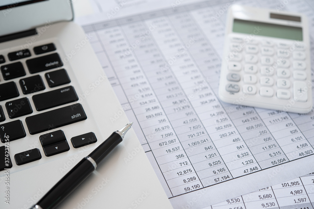 accaccounting report with financial statement on accountant desk. accaccounting report with financial statement on accountant desk.