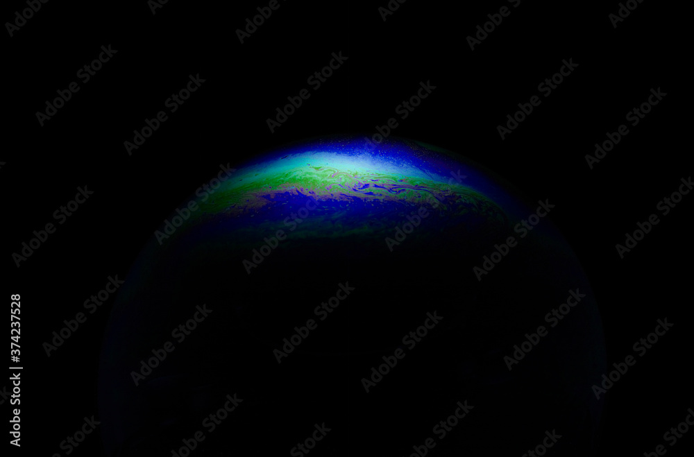 Close-up of soap bubble film in various colors