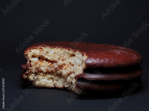 Choco Pie Chocolate isolated on black background. Choco Pie coated snack